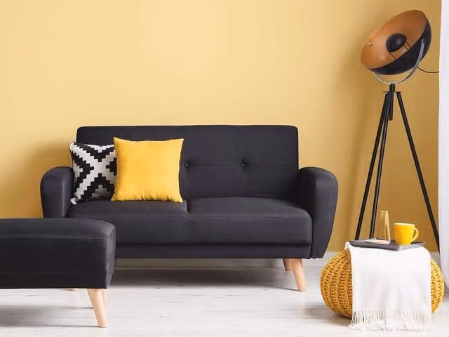 Divano Letto Click Clack Beliani Rivestito in Tessuto Nero con Gambe in Legno di Gomma per Soggiorno Moderno e Minimalista