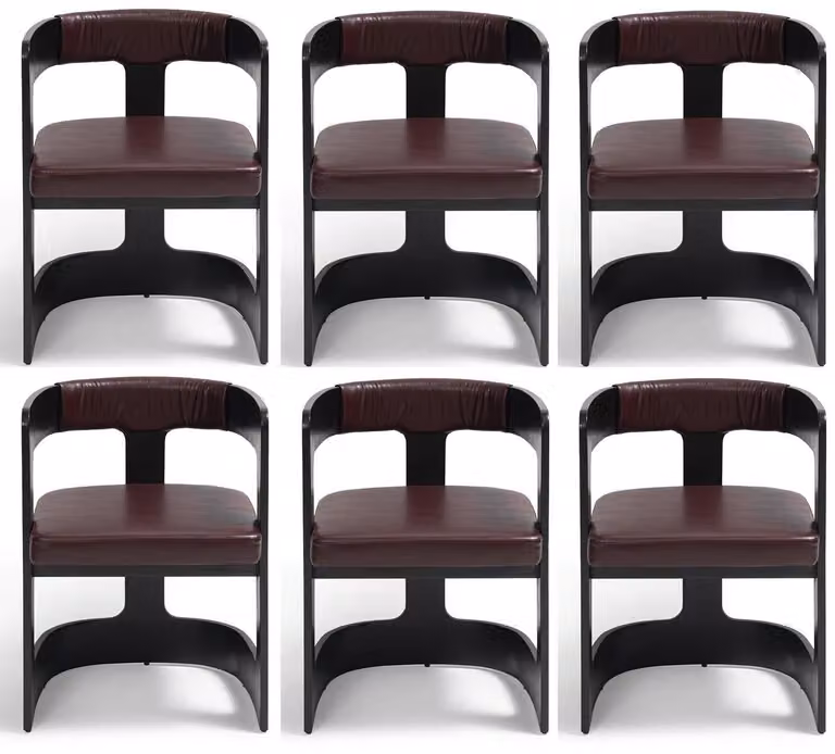 Gruppo di sedie dal design moderno, in pelle e legno, di colore nero, dal design elegante ed esclusivo