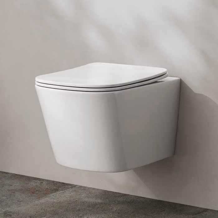 Set completo per vaso sospeso a muro Kronenbach, modello compatto, senza brida, con scarico a rotazione e sedile sottile