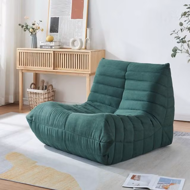 Poltrona bassa imbottita Kodsø en.casa in microfibra verde L 75 cm x P 90 cm x H 100 cm