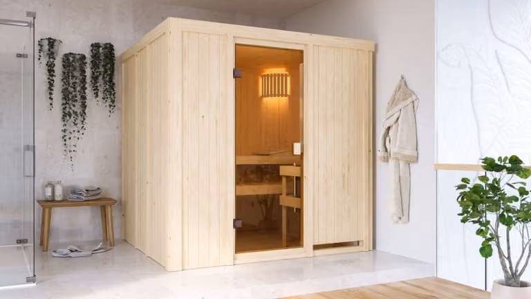 Sauna Woodfeeling Tromsö (ingresso frontale), porta interamente in vetro, colore bronzo, riscaldatore da 9 kW con unità di controllo integrata