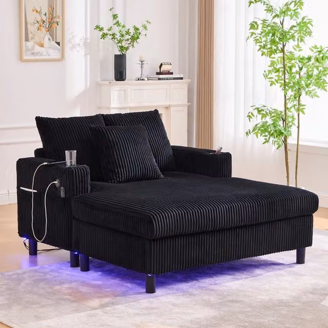 Poltrona oversize MIVRAY in velluto a coste nero con LED multicolore, porte USB, portabevande e tre cuscini