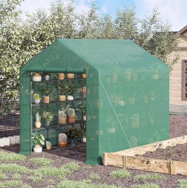 Serra da giardino ULEVR con ripiani laterali, porta avvolgibile e copertura in PE verde, telaio in acciaio