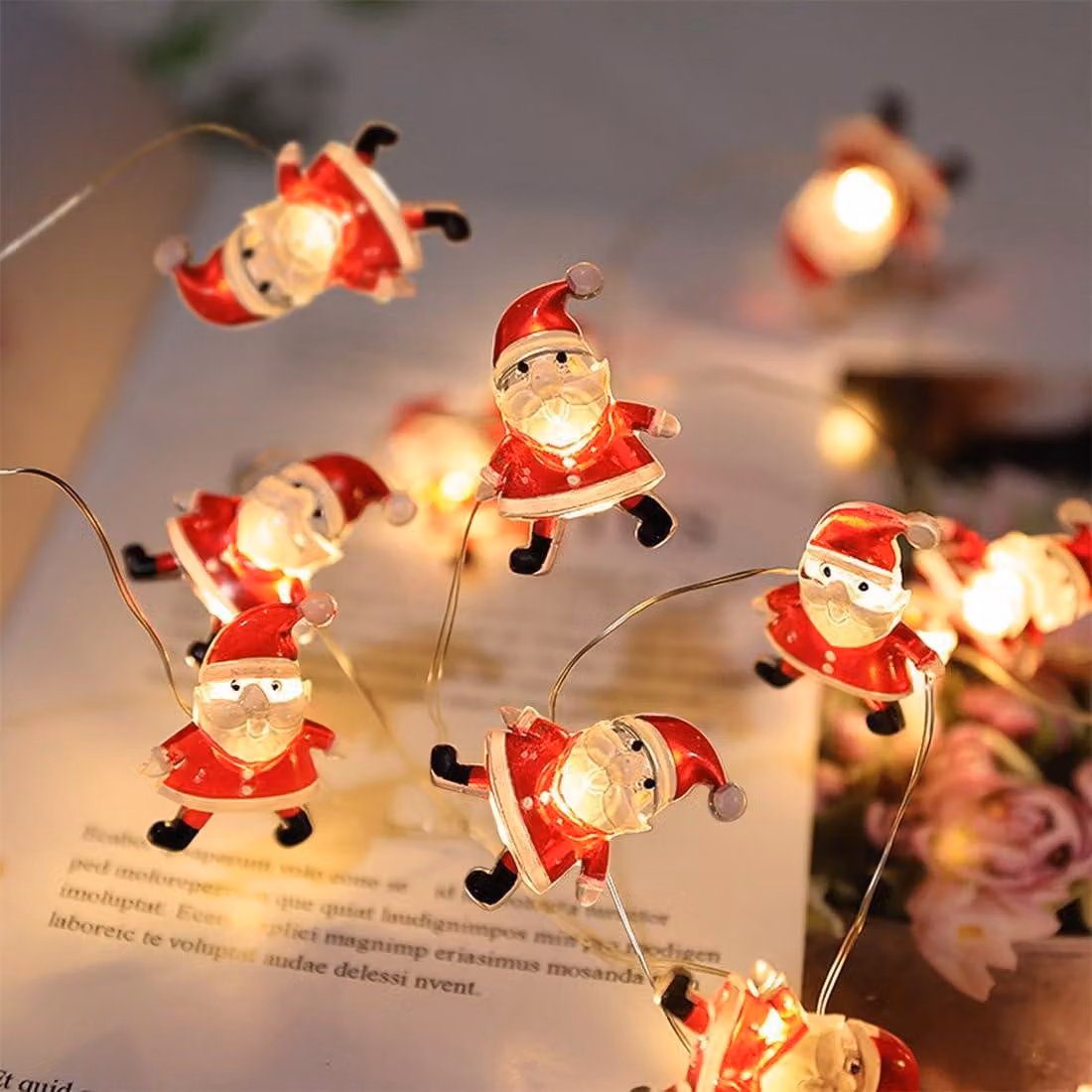 Catena luminosa da 2 metri, con 20 LED, a forma di Babbo Natale, luce bianco caldo, alimentata a batteria