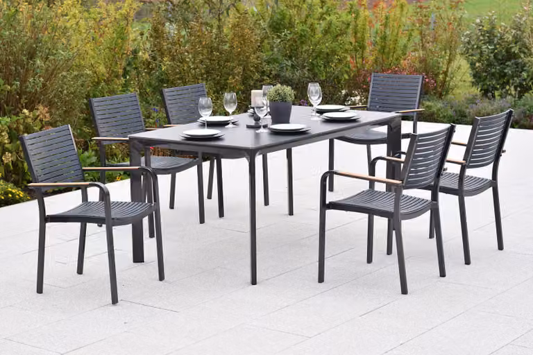 Set di mobili da giardino Merxx Paliano, 7 pezzi, 6 sedie impilabili, tavolo 160 x 90 cm – acciaio/plastica