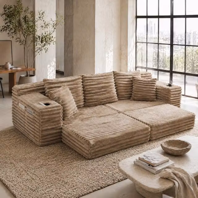 Divano modulare in tessuto corduroy color khaki; schienale alto; tasche laterali e portabicchieri