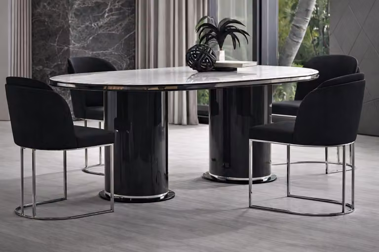 Elegante set da pranzo ovale con sedie nere e dettagli cromati