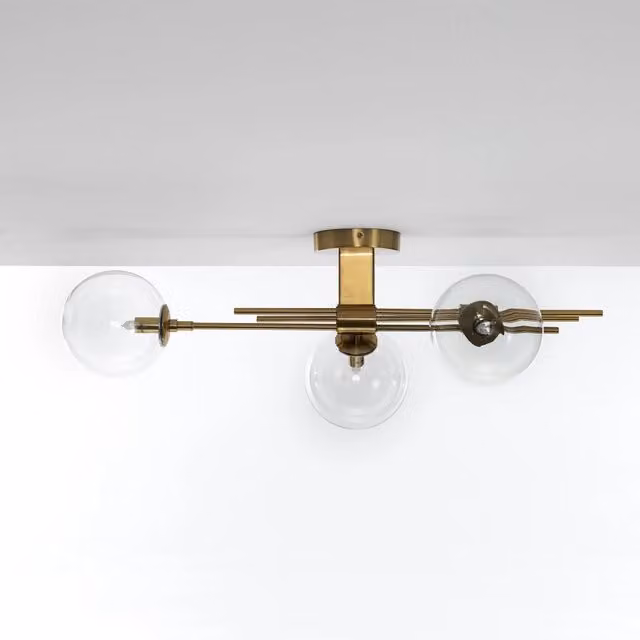 Lampadario a soffitto ORESTELUCHETTA in metallo e vetro color ottone con diffusore a sfera trasparente L: 74 cm, P: 20 cm, H: 23 cm