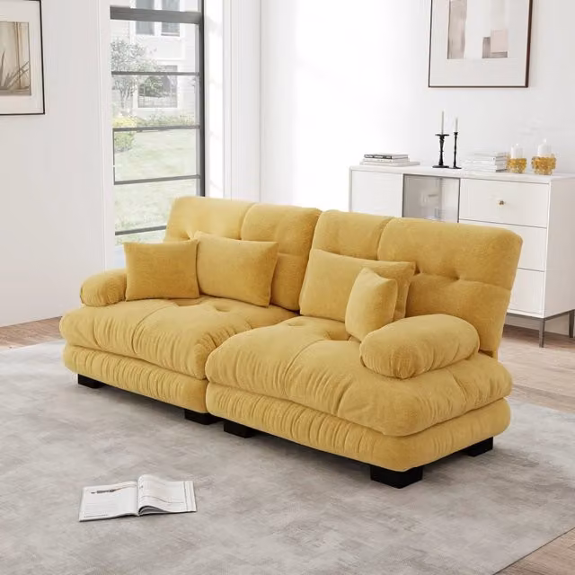 Divano modulare con cuscini decorativi e lombari in ciniglia giallo
