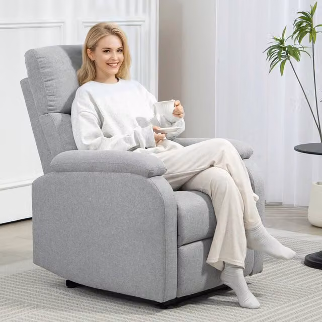 Poltrona relax con schienale reclinabile fino a 60° e poggiapiedi retrattile in poliestere grigio per soggiorno