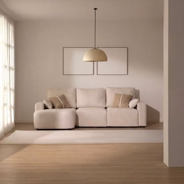 Divano angolare Malco Banak a 4 posti con chaise longue sinistra, colore beige, design moderno in tessuto con cuscini decorativi inclusi
