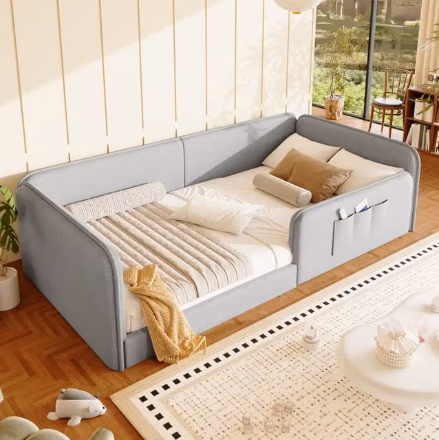 Letto singolo ULEVR 90x200 cm imbottito con rivestimento in lino grigio, struttura bassa con tasche laterali