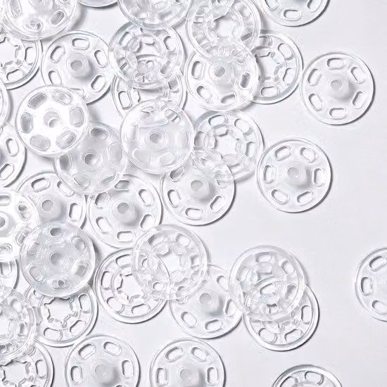 Piccolo bottone a pressione in plastica trasparente da 21 mm