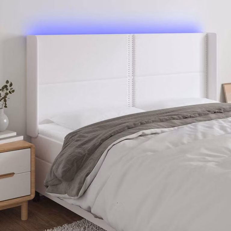 Testiera per letto con illuminazione LED e porta di ricarica USB vidaXL in similpelle bianca, L: 203 cm, P: 16 cm, H: 118/128 cm