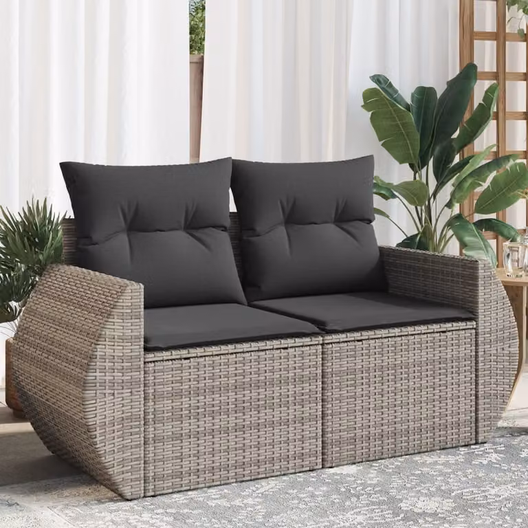 vidaXL Divano da giardino a 2 posti in polyrattan grigio con cuscini inclusi