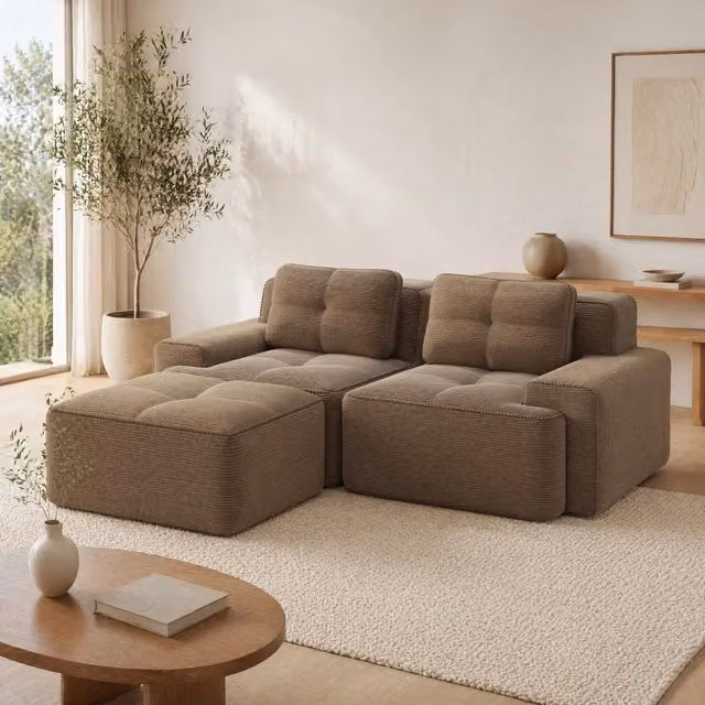 Divano modulare con seduta profonda in corduroy marrone; design moderno senza montaggio