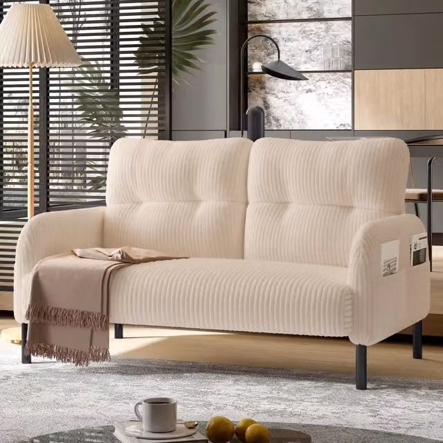 Divano 2 posti OKWISH in velluto a coste beige con tasca laterale, schienale ergonomico e struttura in metallo, L: 120 cm, P: 75 cm, H: 79 cm