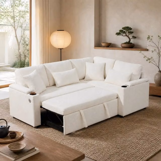 Sofà angolare con letto estraibile REDOM beige in ciniglia, dotato di porta bicchieri, ricarica USB e cuscini decorativi, L/P/H: 206,5 x 141 x 86 cm