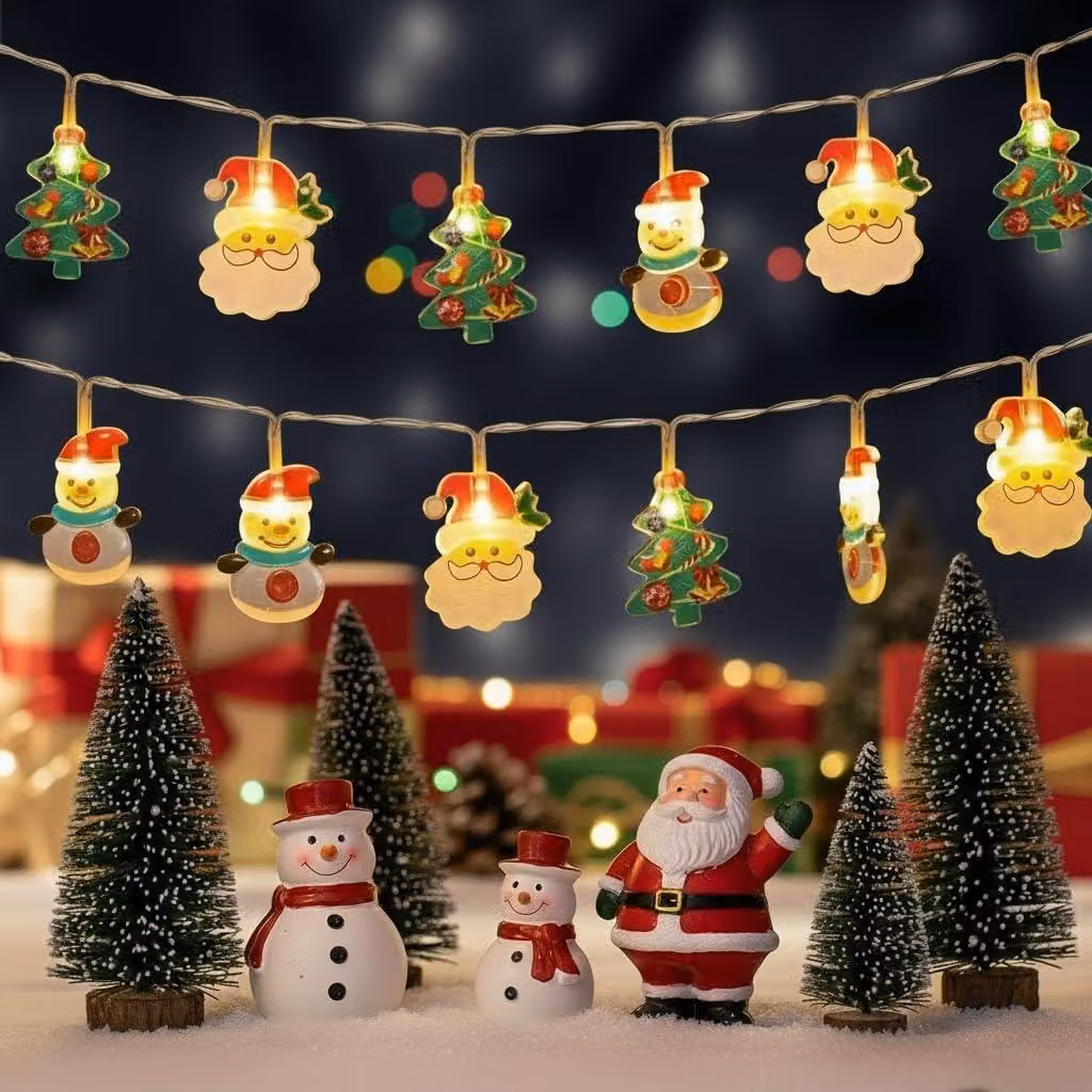 Catena luminosa con 40 LED, a tema natalizio (Babbo Natale, pupazzo di neve, albero di Natale), alimentata a batteria