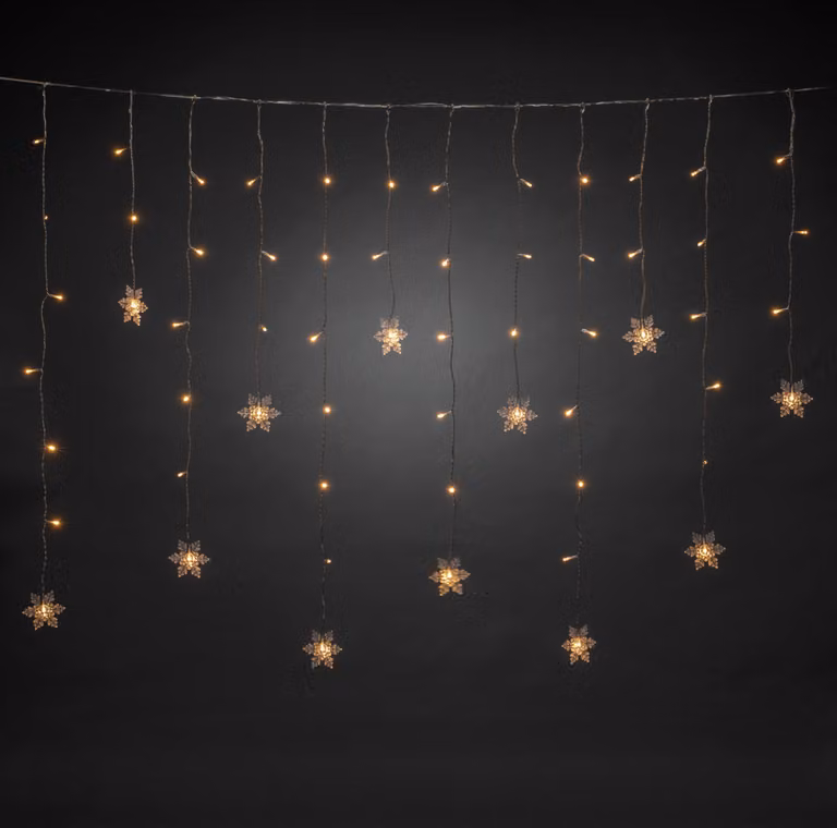 Konstsmide - Barriera luminosa a LED, 12 fiocchi di neve trasparenti, 60 diodi bianco caldo, 4,5 V, per esterni (IP44), cavo trasparente - 4049-103