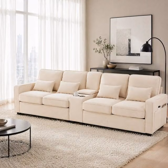Divano 4 posti REDOM beige con ricarica USB, portabicchieri e 4 cuscini, L: 290 cm, P: 83 cm, H: 88 cm