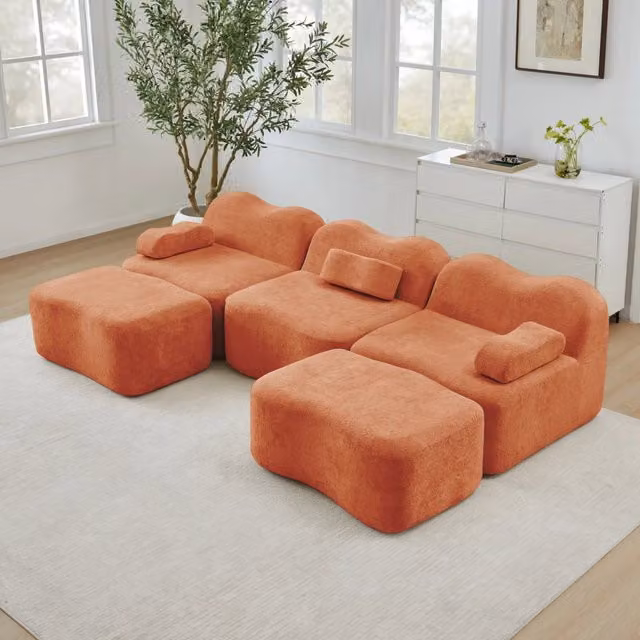 Divano a U 288x167x70 cm in velluto arancione con 2 pouf, per spazi piccoli –