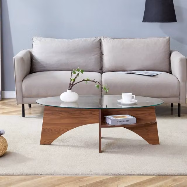 Tavolino da salotto ULEVR ovale con piano in vetro di sicurezza e ripiano inferiore, MDF color noce