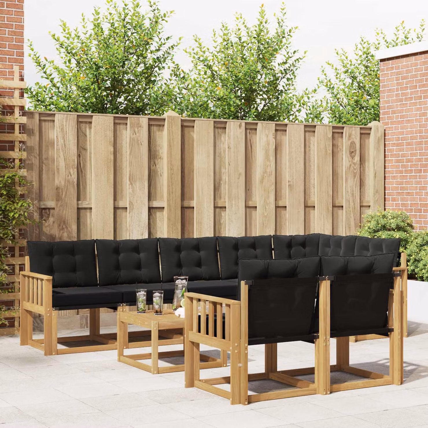 vidaXL Set di divani da esterno a L in legno di acacia con tavolino e cuscini, Bianco e Nero