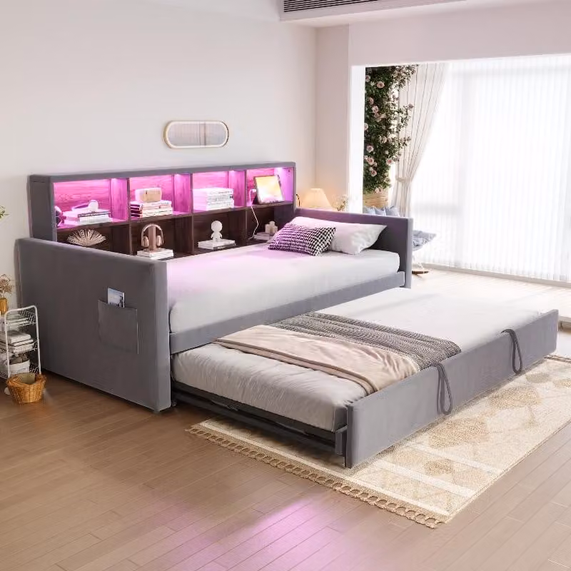 Letto imbottito 90x190 cm, divano letto con meccanismo estraibile, rivestito in velluto color grigio scuro, con testiera contenitore, illuminazione LED e prese di corrente