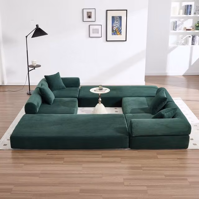 Divano modulare MIVRAY in velluto a coste verde con elementi combinabili e design moderno per il tuo soggiorno