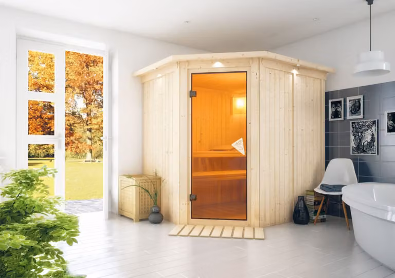Sauna Karibu Lilja (ingresso ad angolo), porta tutto vetro, colore bronzo, riscaldatore 3,6 kW centralina integrata