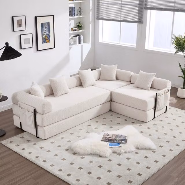Divano modulare REDOM a L in velluto a coste beige con funzione letto e cuscini inclusi L/P/H: 270 x 180 x 64 cm