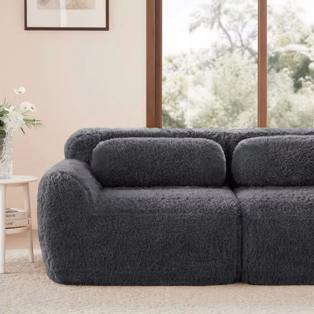 Divano senza braccioli Aviana Zephmum in tessuto grigio con pouf coordinato