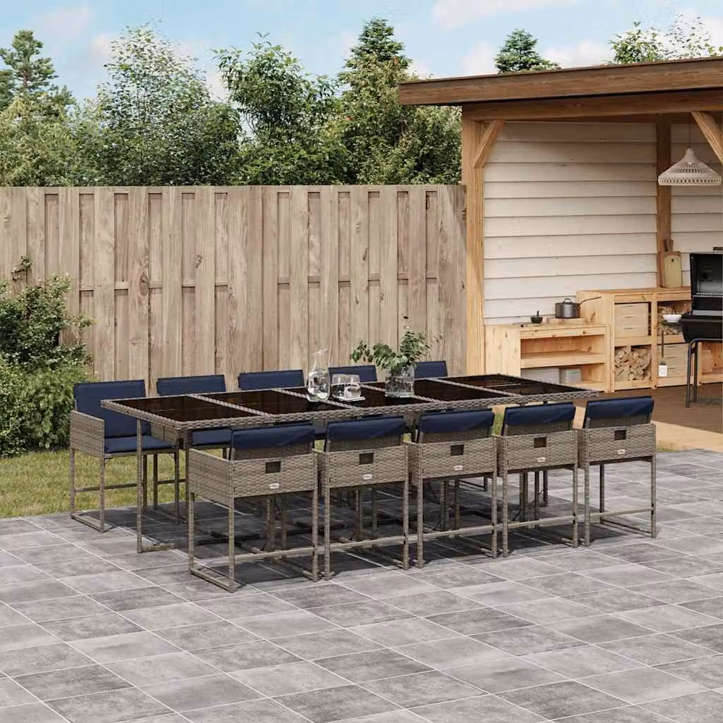 vidaXL Set da pranzo da giardino da 11 pz in polyrattan con piano in vetro e cuscini Grigio