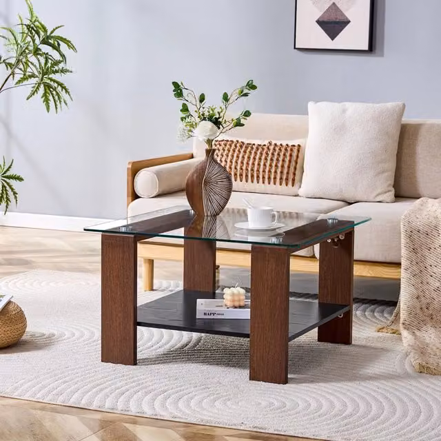 Tavolino basso moderno OKWISH per soggiorno con piano in vetro trasparente e struttura in MDF color noce, L: 65 cm, P: 41 cm, H: 45,5 cm