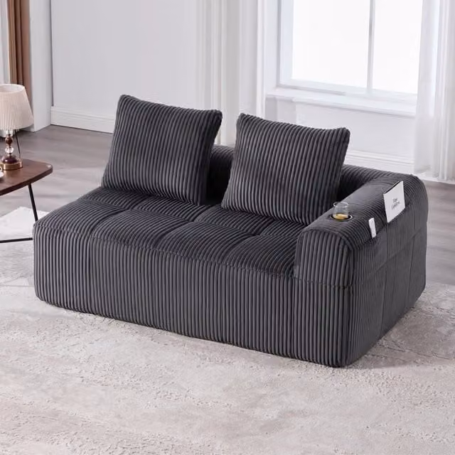 Divano compatto ULEVR 158x93x61 cm con tasche laterali e portabicchieri, rivestimento in velluto a coste grigio scuro