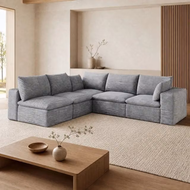 Divano modulare in tessuto grigio, senza struttura in legno