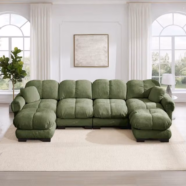 Divano panoramico modulare MIVRAY a 4 posti in tessuto verde con pouf e cuscini, design moderno a forma di U, L: 330 cm, P: 149 cm, H: 90 cm