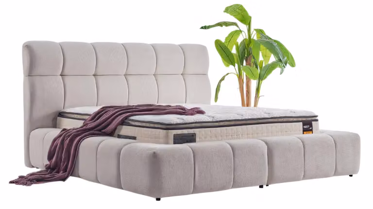 Massives Bett mit voluminösem Design hohem breitem Kopfteil in Grau