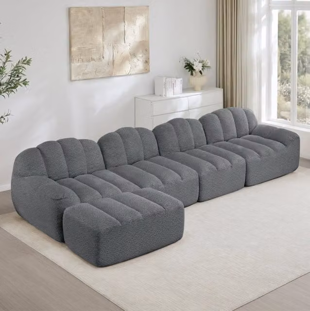 Divano modulare MODFU a 4 posti con ottomana, modello a L con orientamento a sinistra, rivestimento in tessuto grigio, L/P/H: 366 x 165 x 79 cm