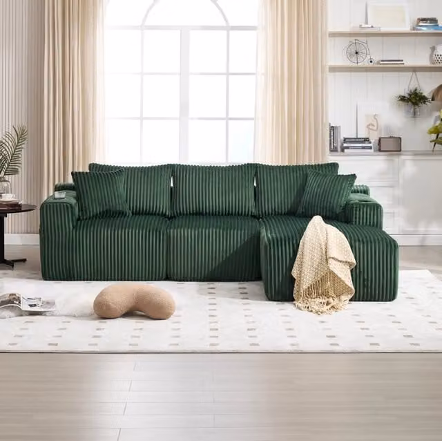 Divano modulare 257x160x62 cm in tessuto verde con tasche laterali, per piccoli spazi –