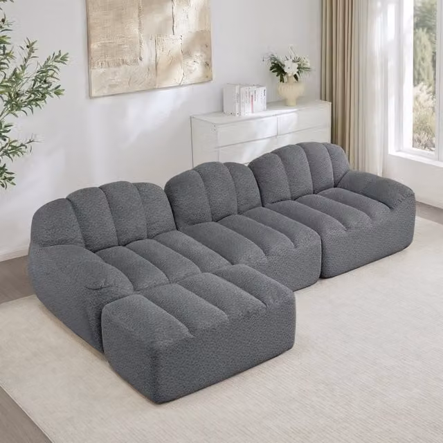 Divano modulare angolare 3 posti con pouf in pile granulare grigio