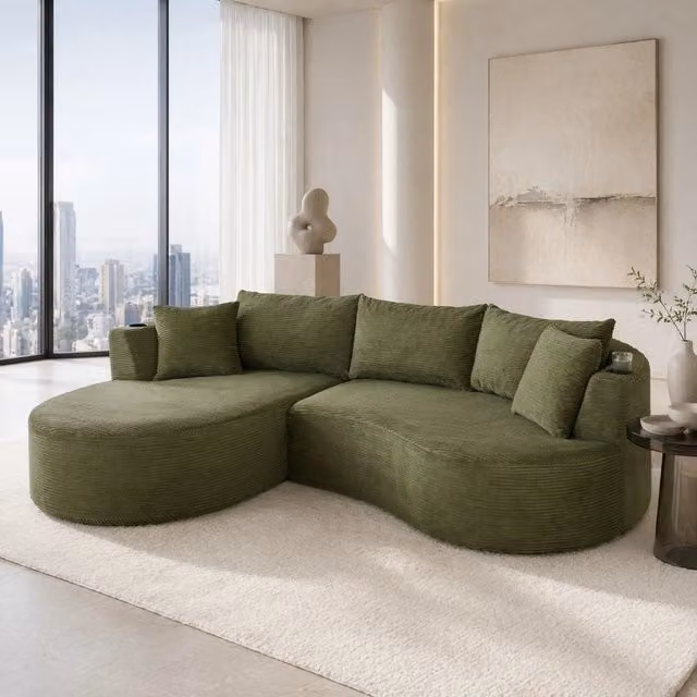 Divano 3 posti con portabicchieri; design arcuato; velluto a coste verde e cuscini