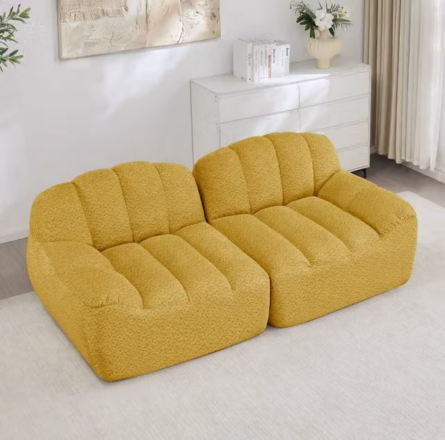 Divano modulare senza struttura; forma ergonomica; velluto granulato; giallo