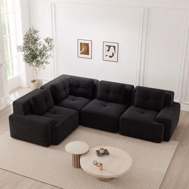 Divano angolare modulare senza montaggio con design antiscivolo e seduta profonda in velluto a coste nero per soggiorno