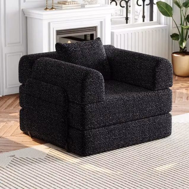 Poltrona letto 2 in 1 in ciniglia nera con vano portaoggetti nel bracciolo