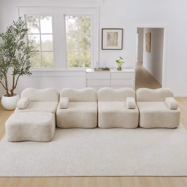 Divano modulare angolare 4 posti senza struttura con pouf, seduta profonda e braccioli mobili, in velluto beige