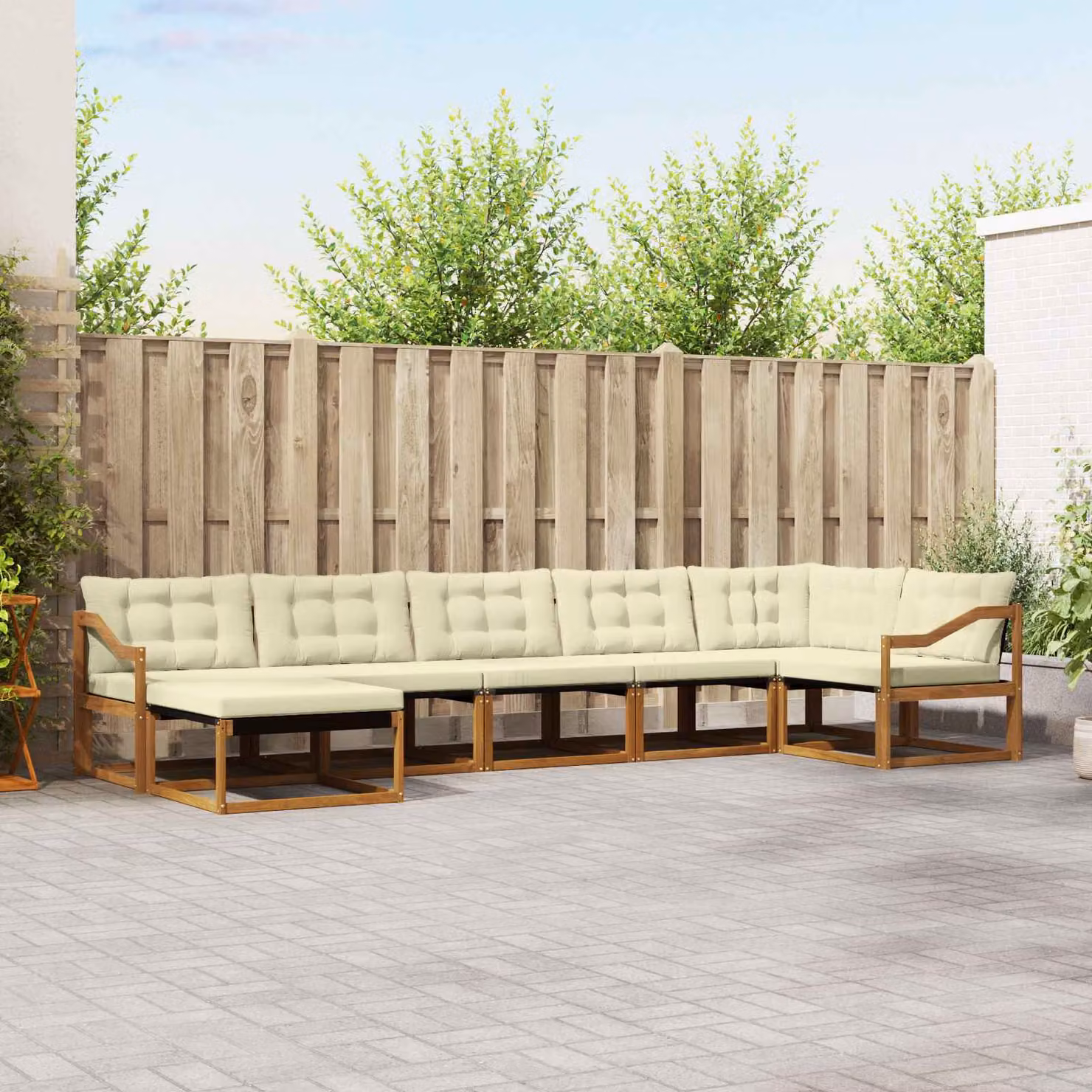 Set di divani da esterno vidaXL 7 pz a forma di L in legno di acacia con cuscini beige e pouf coordinato