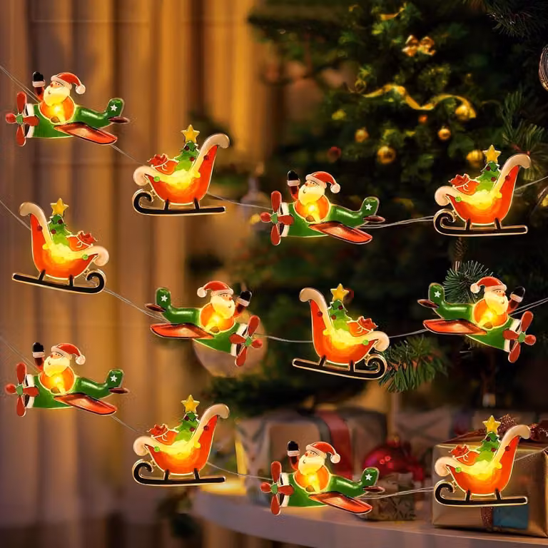 Catena luminosa con decorazioni natalizie (Babbo Natale, slitta e aeroplano), lunghezza 3 metri, 30 LED, alimentazione a batteria