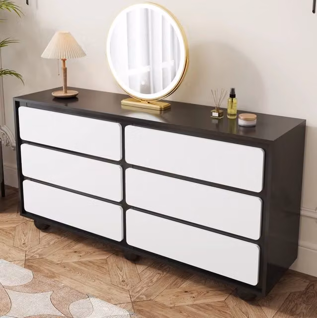 Cassettiera moderna con sei cassetti in finitura lucida bianco e nero con dettagli in metallo